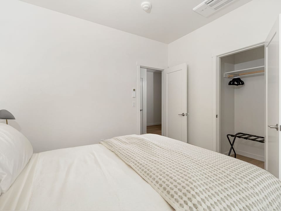 Bedroom #2: Queen bed with a full bathroom located directly across the hallway.
