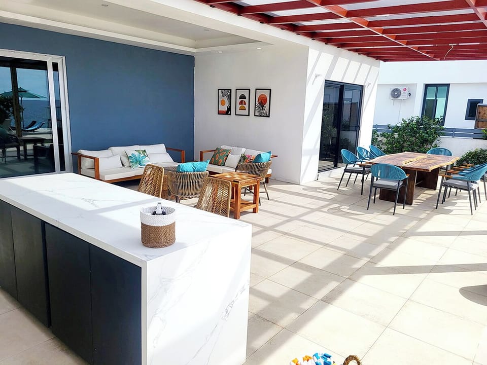 Outdoor bar, sitting and dining area