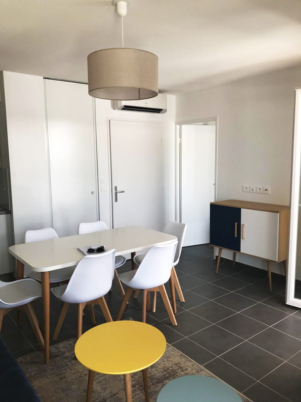 Prepare meals in the kitchenette and enjoy them at the dining table.