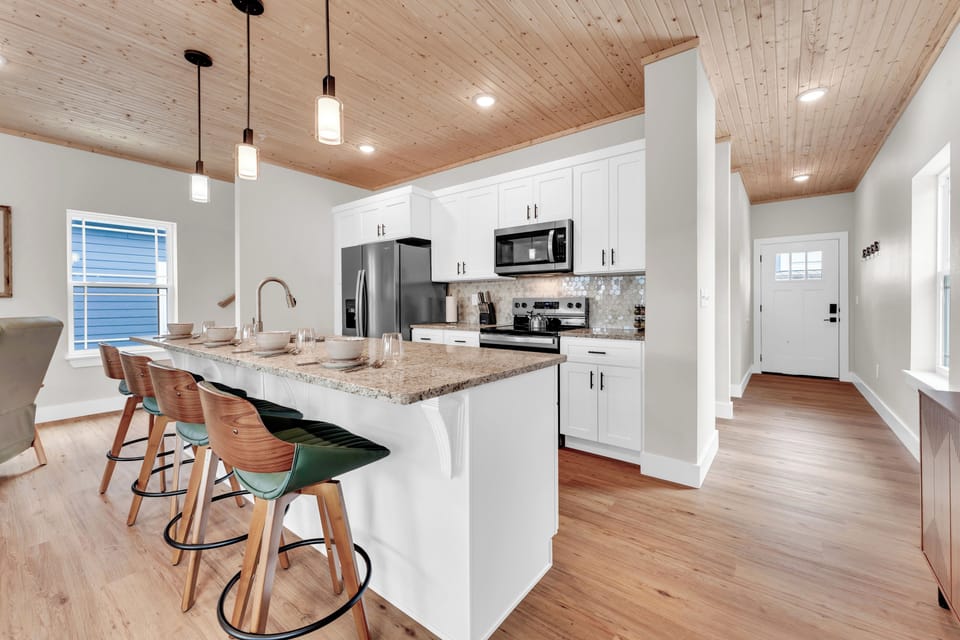 This modern kitchen island offers plenty of space for casual dining.