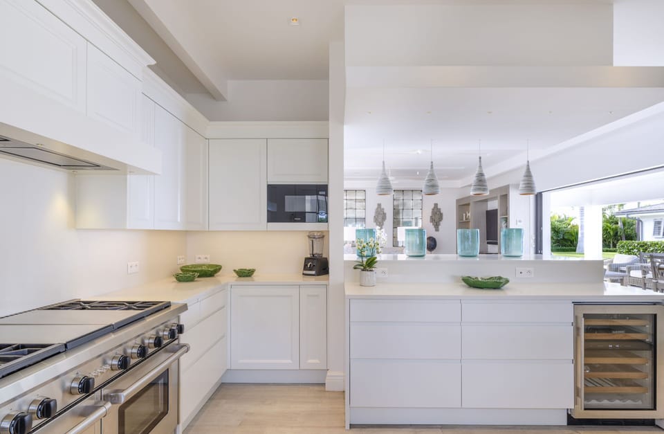 Fully equipped and air-conditioned kitchen. Electric oven, gas stove, microwave, refrigerator, mixer, centrifuge, freezer, dishwasher, Nespresso machine, blender, kettle, toaster, breakfast bar. Outdoor dining area under an ajoupa on the back of the prope