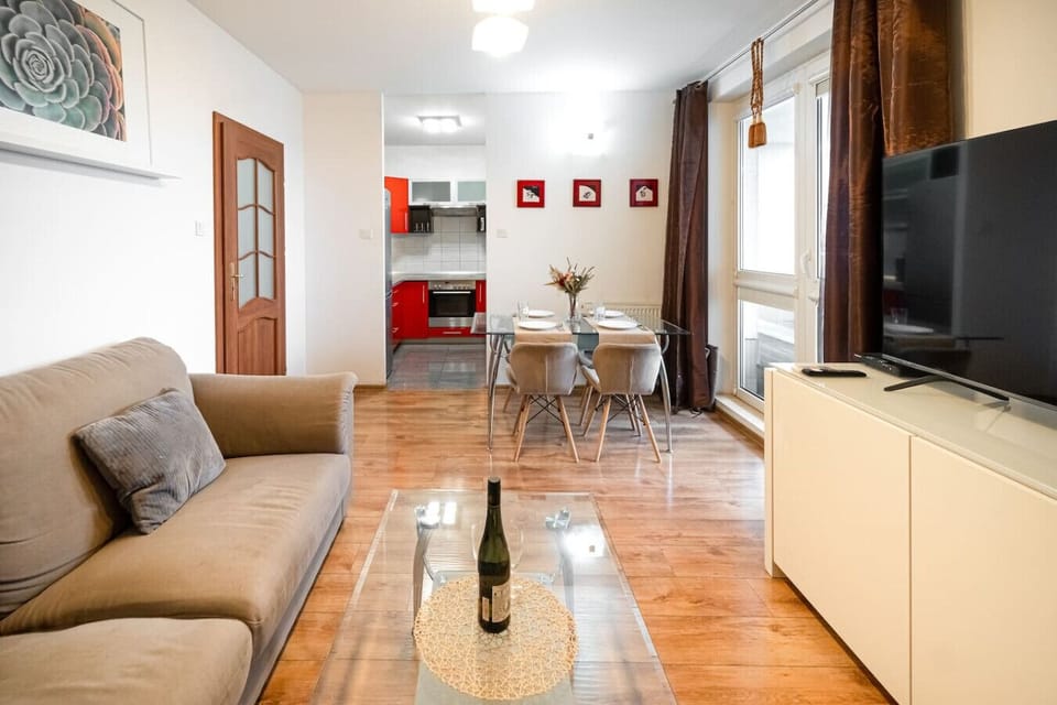 Living Room with Smart TV and Dining Table | Book Now with RENTUJEMY.COM