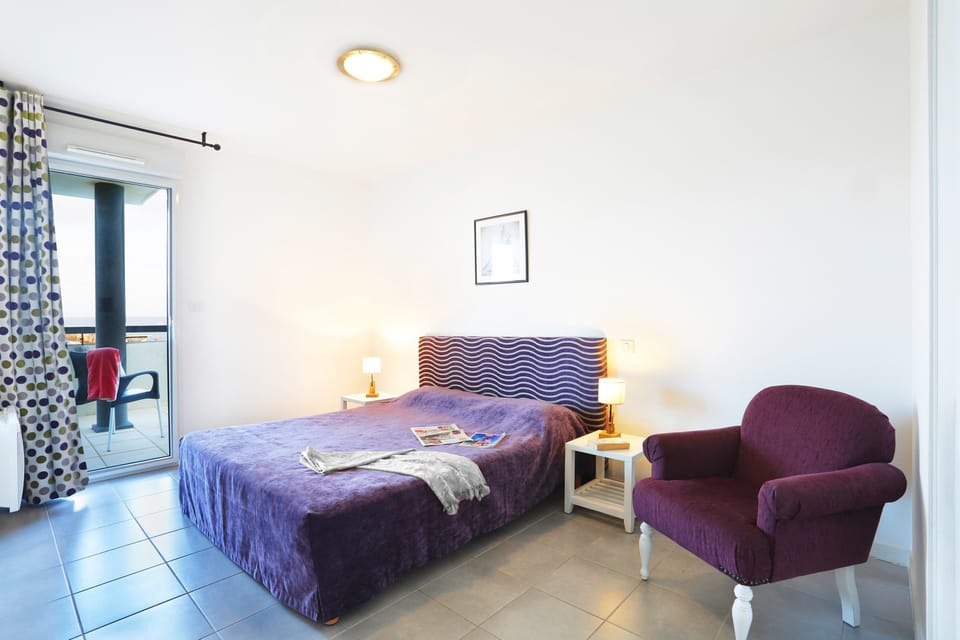 Drift to sleep in the Double bed in the master bedroom. (Please note that a sea view is not guaranteed.)