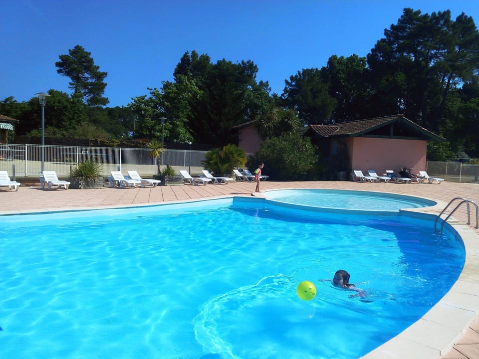 Spend time with your loved ones in the outdoor pool, open during the summer.