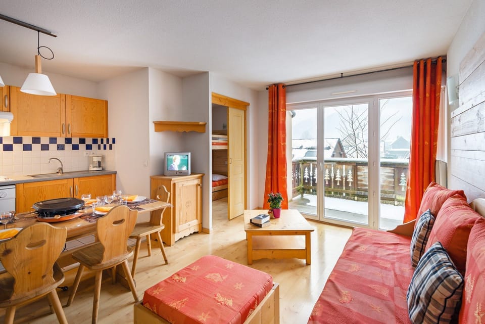 Prepare meals in the kitchenette and enjoy them at the dining table.