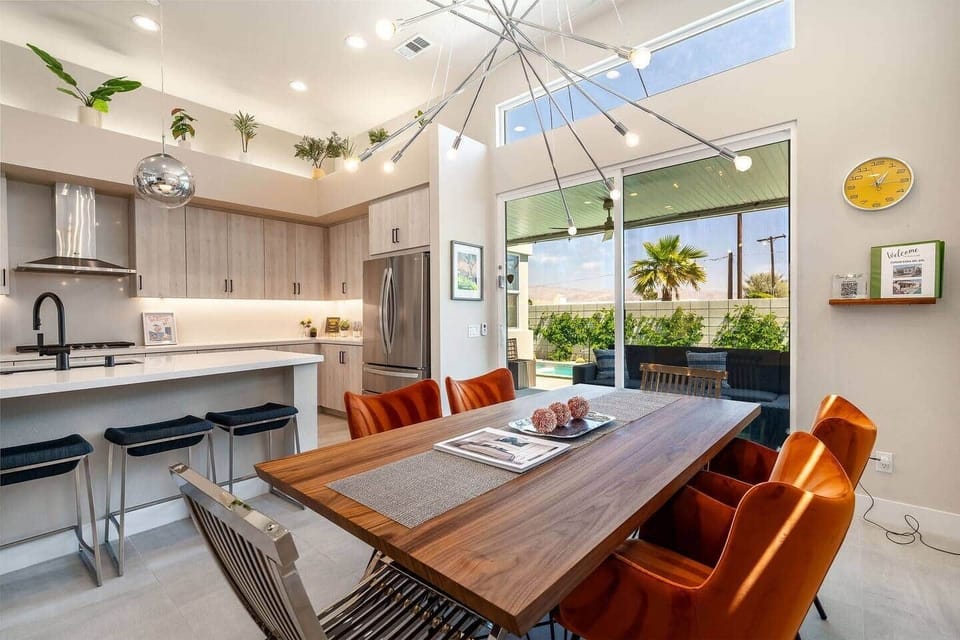 Modern dining space with seating for 8 guests.