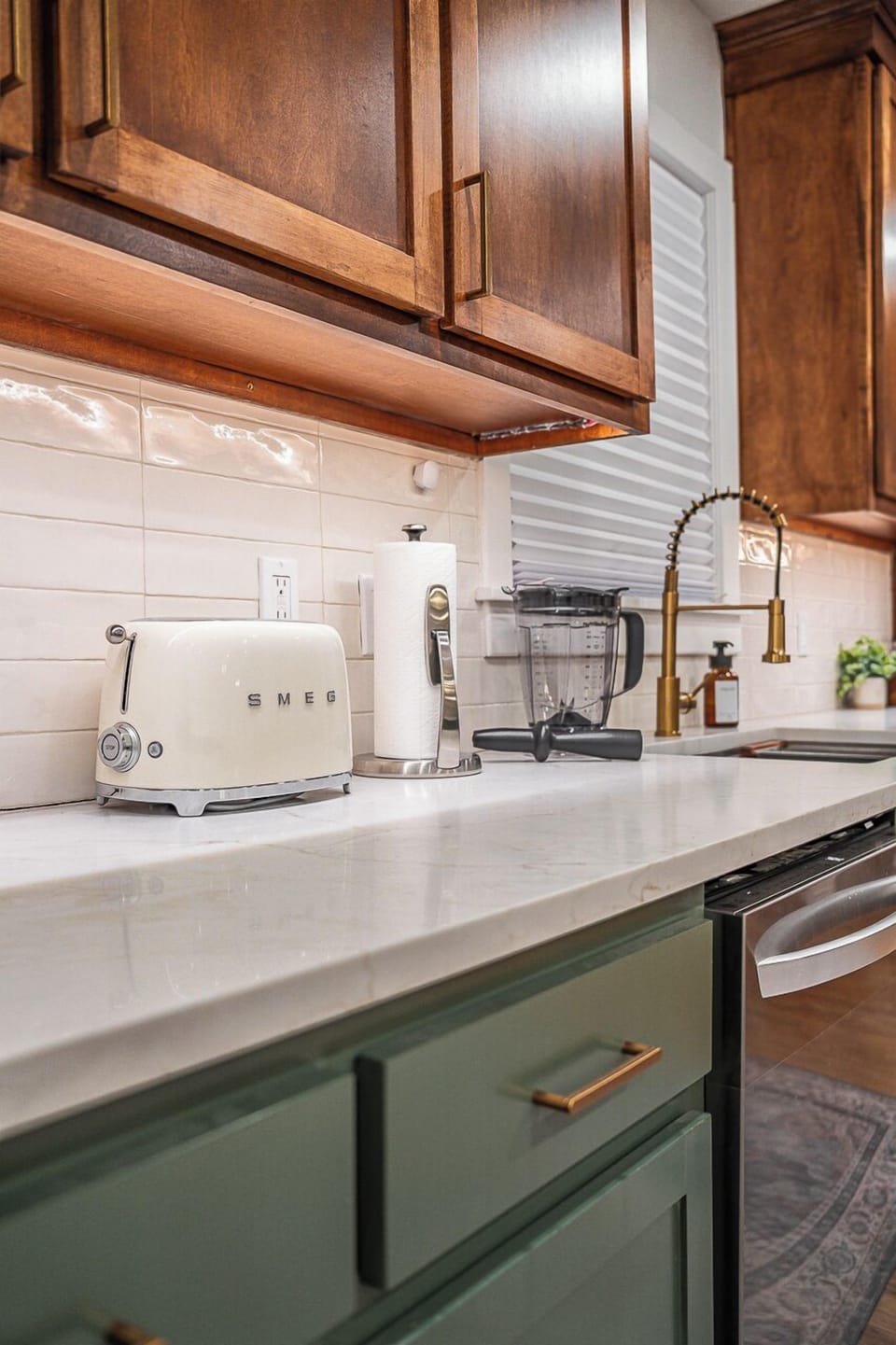 Modern kitchen essentials ready for your stay, featuring stylish appliances and a clean, functional design.
