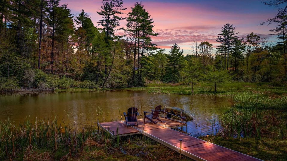 Watch your private lake transform at dusk — all rose and gold as the sun drops behind the ridgeline. Pull up a chair and let the evening come to you.