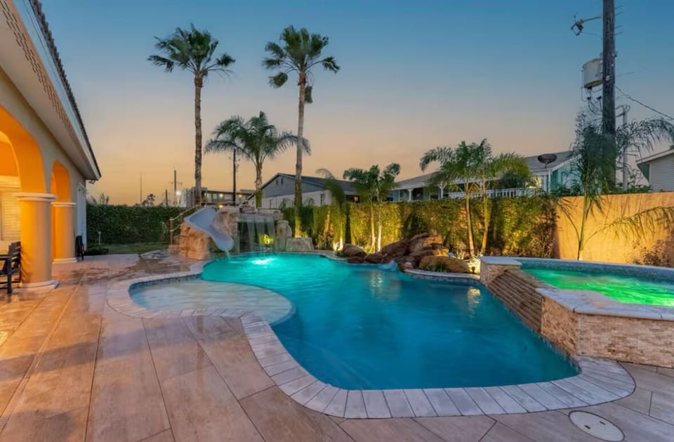 Sunset serenity by the palm-lined pool