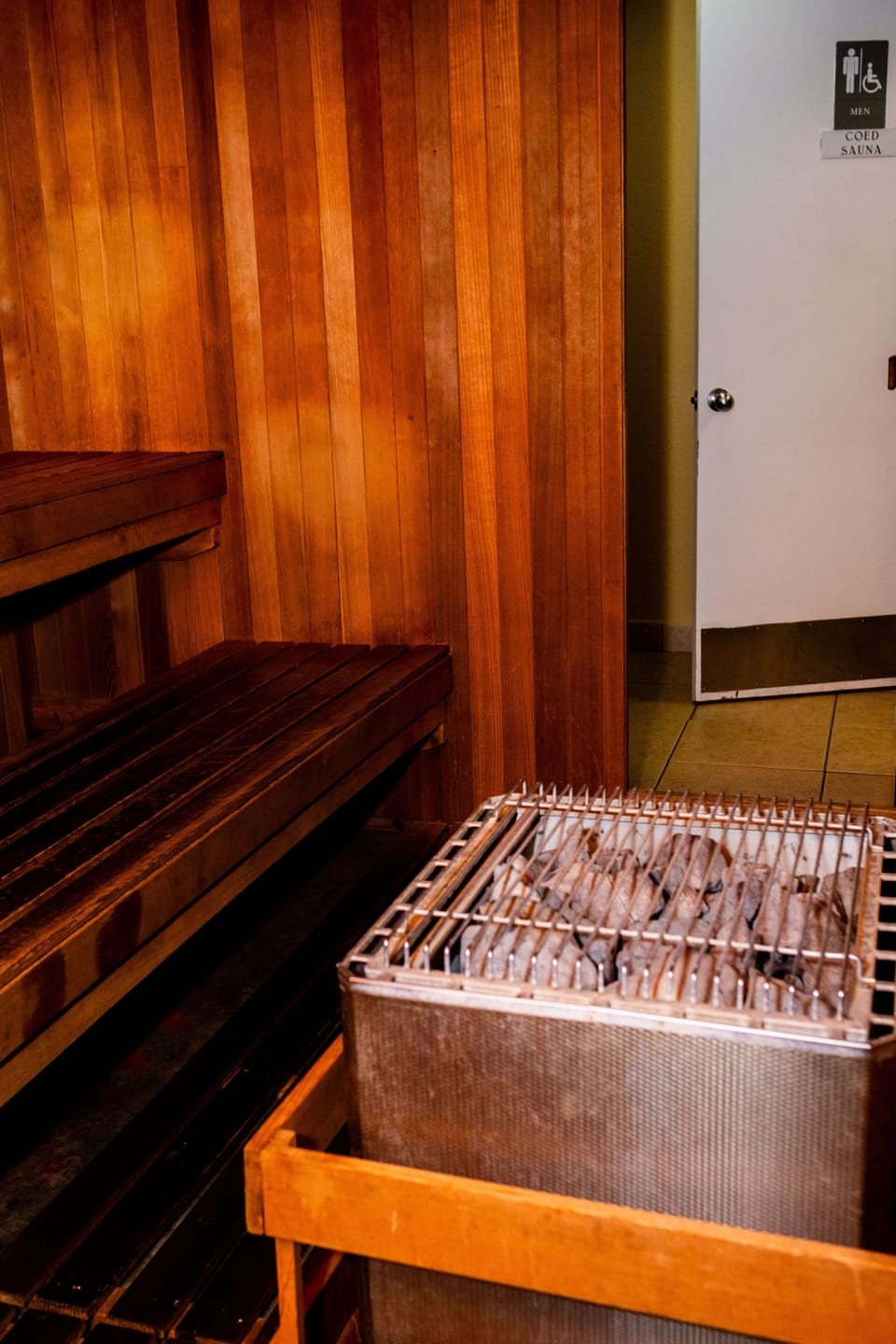 Experience ultimate relaxation in the coed sauna, featuring warm wooden interiors designed for a soothing escape after a day of adventure.