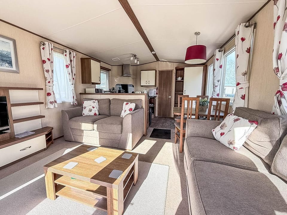 The living area in our 8 berth caravans at Southview Holiday Park is designed for relaxation, making it ideal for your next UK getaway.