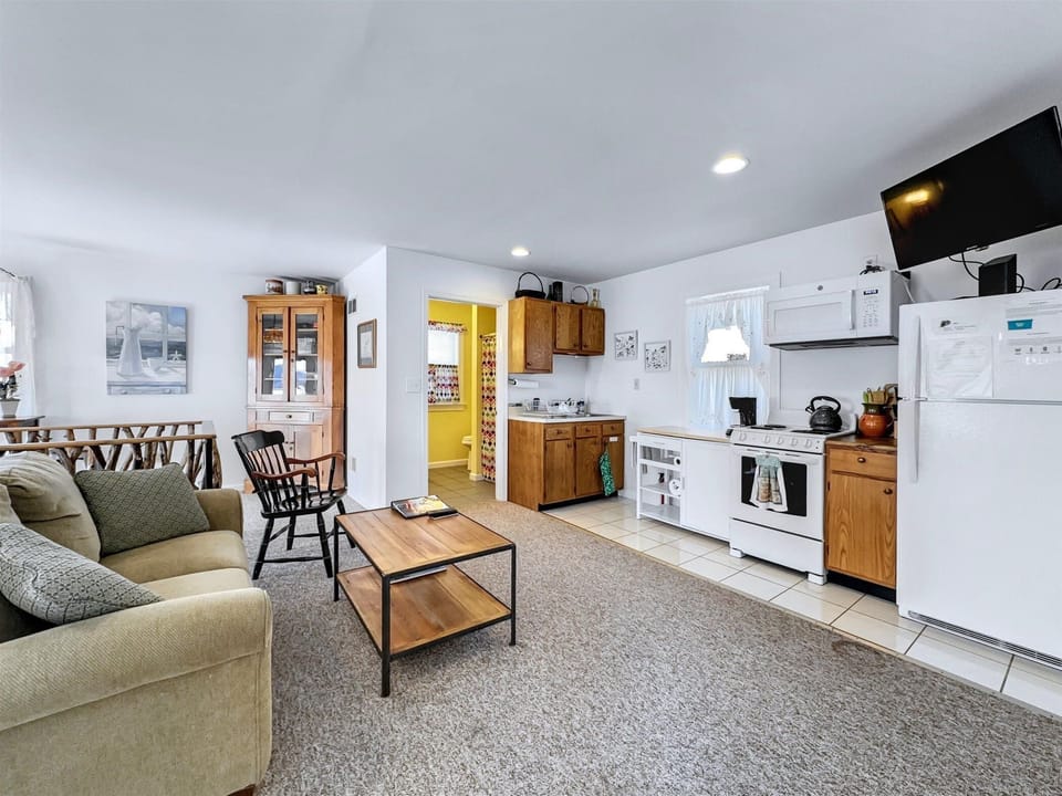 Fully equipped kitchen with stove, microwave, and coffee maker—everything you need for your stay.