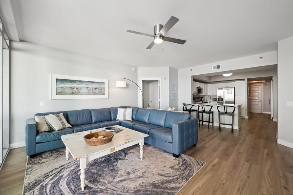Bright and modern open-concept living area with coastal charm — perfect for relaxing after a day on the Galveston beach!