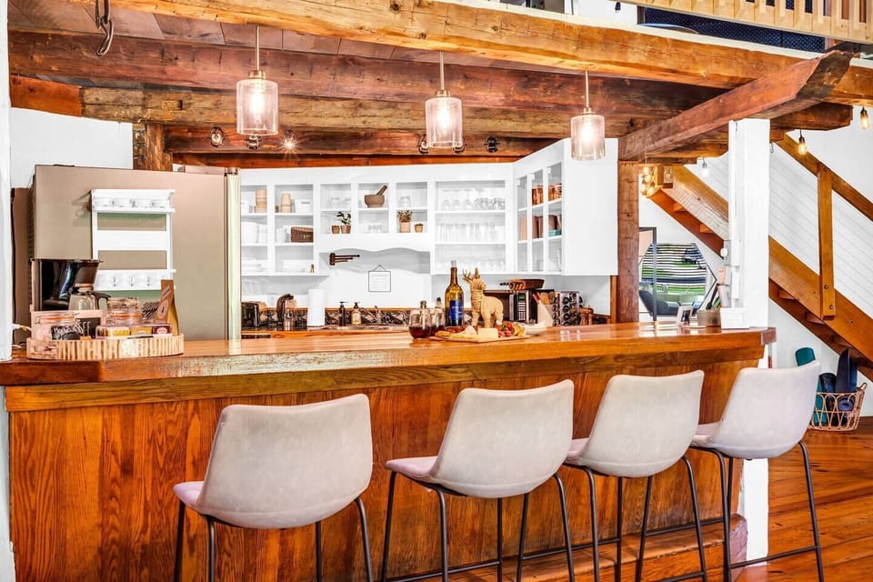 Start your day in our charming breakfast nook, a cozy corner filled with natural light and inviting furnishings. Experience the ideal ambiance for a delightful morning meal and create lasting memories.