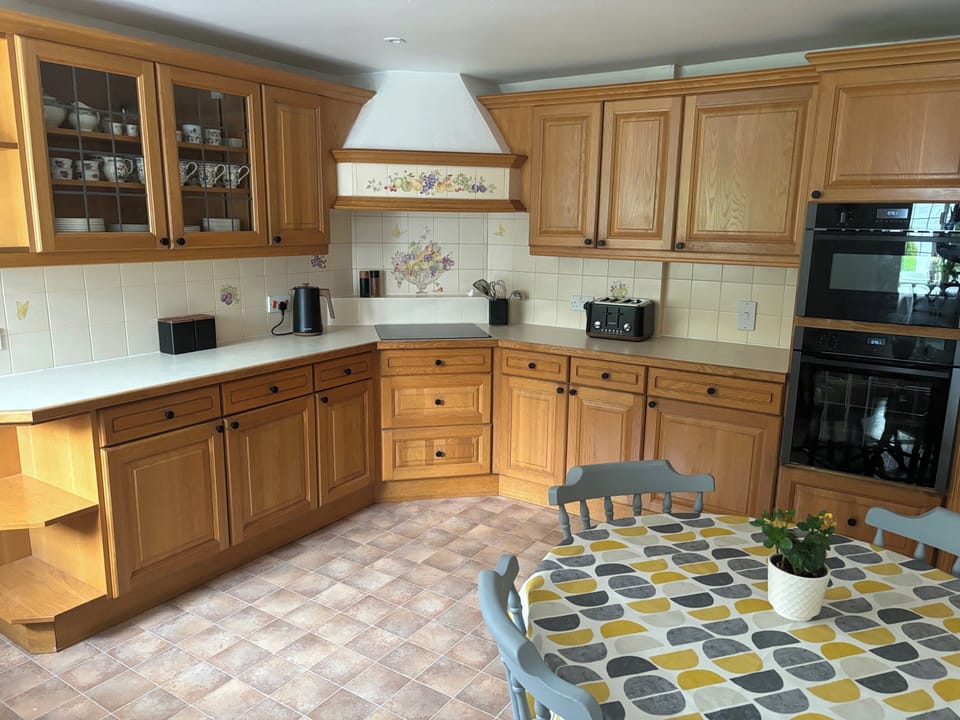 Large well equipped kitchen with all modern appliances.  Situated to the rear of the property and overlooks the patio