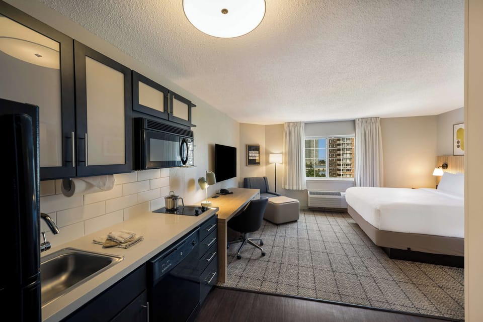 Cook and unwind in a bright studio with city views.