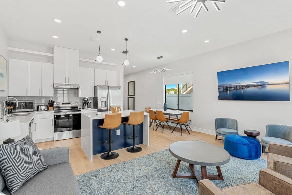 Enjoy a meal in the open kitchen and dining area.