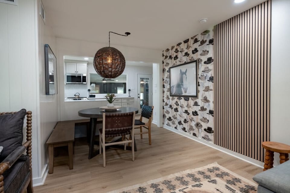 Dining room that is connected to the kitchen and flows to the game room