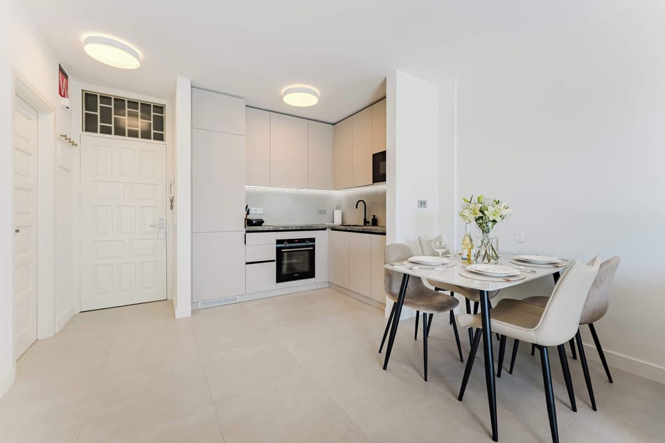 Sophisticated Dining Area Adjacent to Kitchen — Perfect for Shared Meals and Entertaining