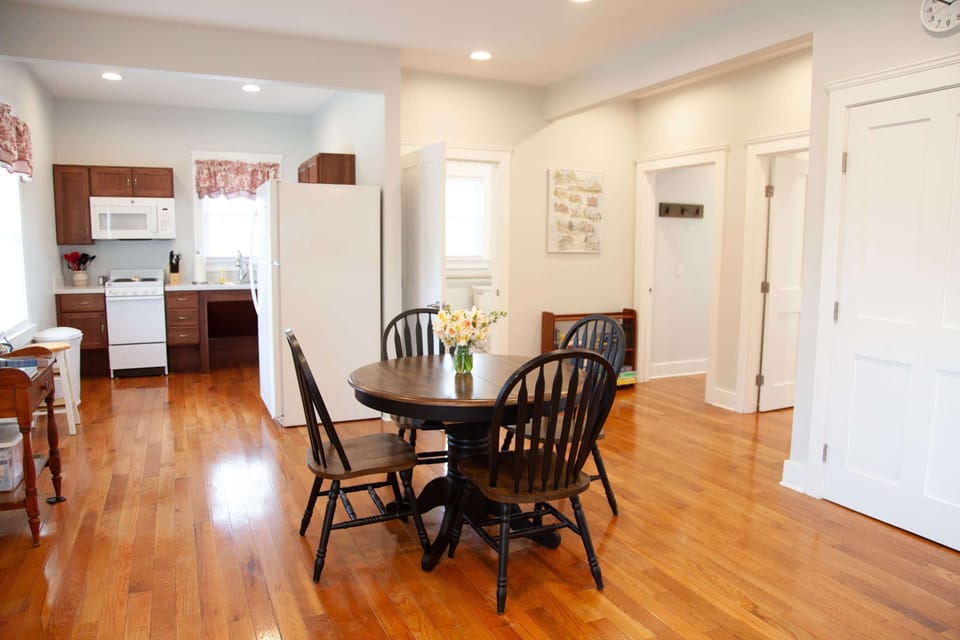 Accessible dining and kitchen – Open layout with roll-under sink for easy access.
