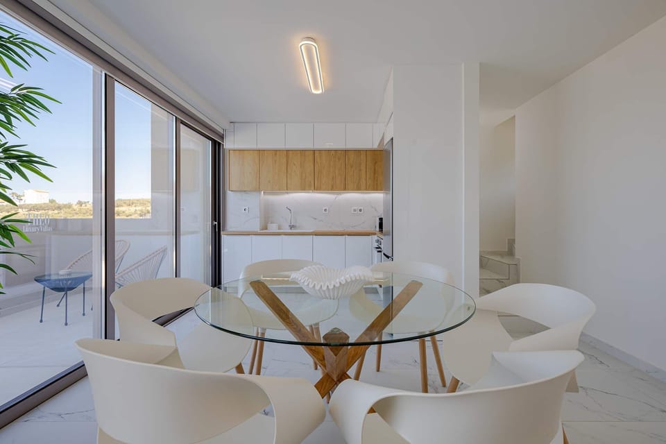 Functional Kitchen and Elegant Dining Space