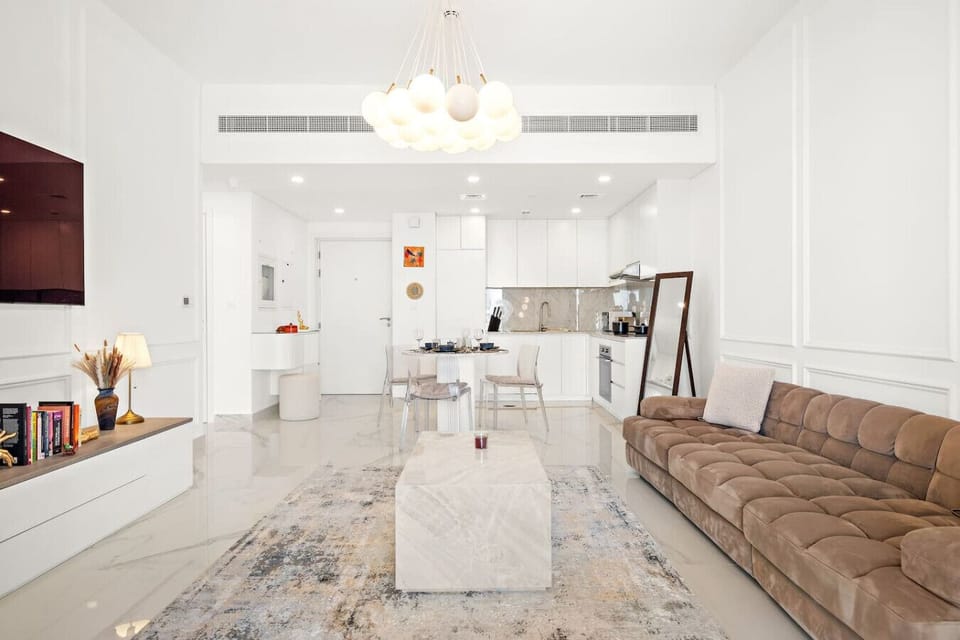Living Room: Bright and airy space with modern decor and an inviting ambiance for relaxation.
