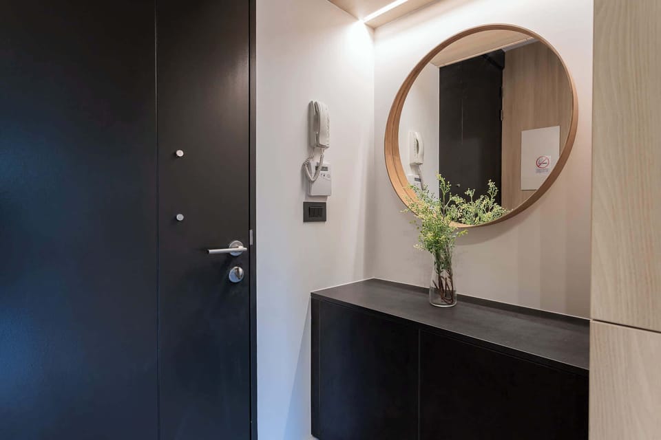 Step into a stylish and welcoming entryway, perfect for setting the tone of your stay.