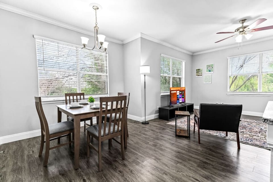 Set the table for memorable meals in this beautifully arranged dining area. With elegant place settings and a charming centerpiece, it's perfect for hosting dinner parties or enjoying family dinners in a cozy and stylish atmosphere.