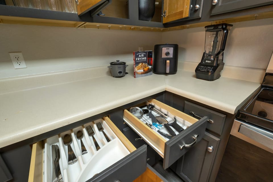 Start your day with fresh smoothies or hot meals—blender, air fryer, and rice cooker included.