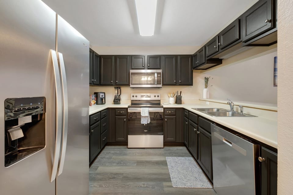 Store your groceries with ease in a spacious stainless steel fridge.