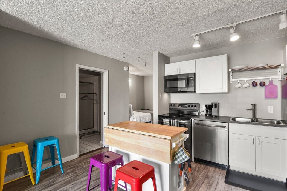 Island offers additional counterspace and dining area