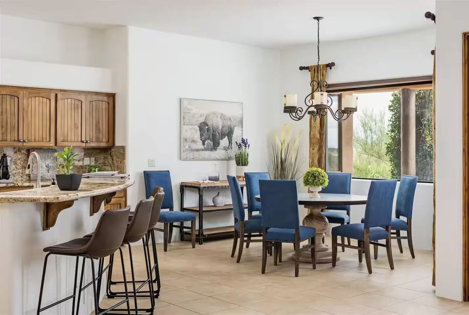 Indoor dining area and fully stocked kitchen area