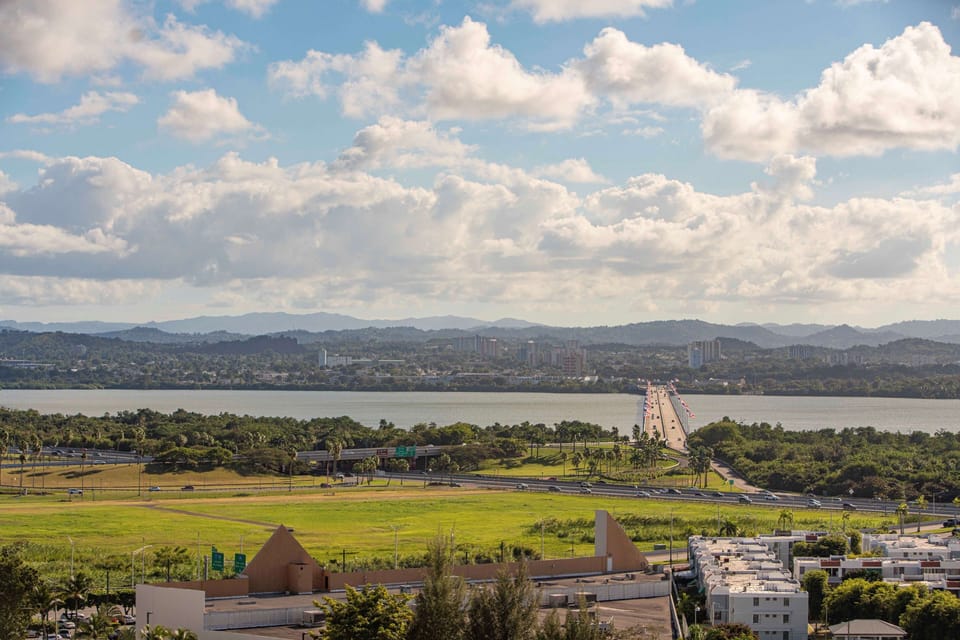 Take in expansive skyline and mountain views beyond the water.