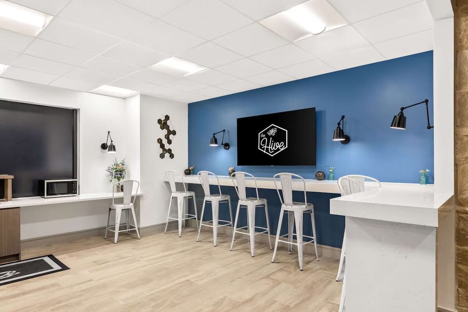 Gather, work, and recharge in the bright communal lounge.