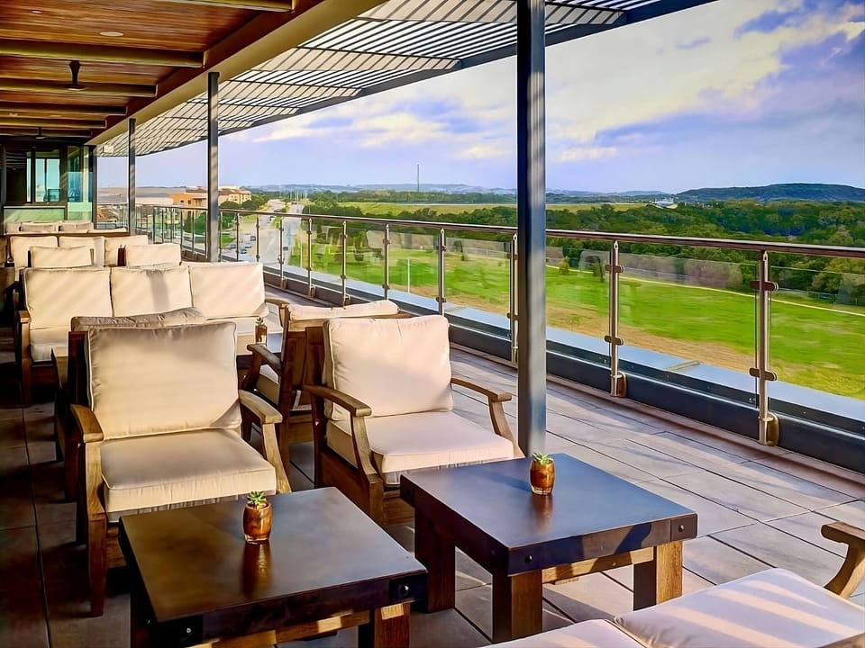 Linger outdoors on the terrace with sweeping hilltop views.