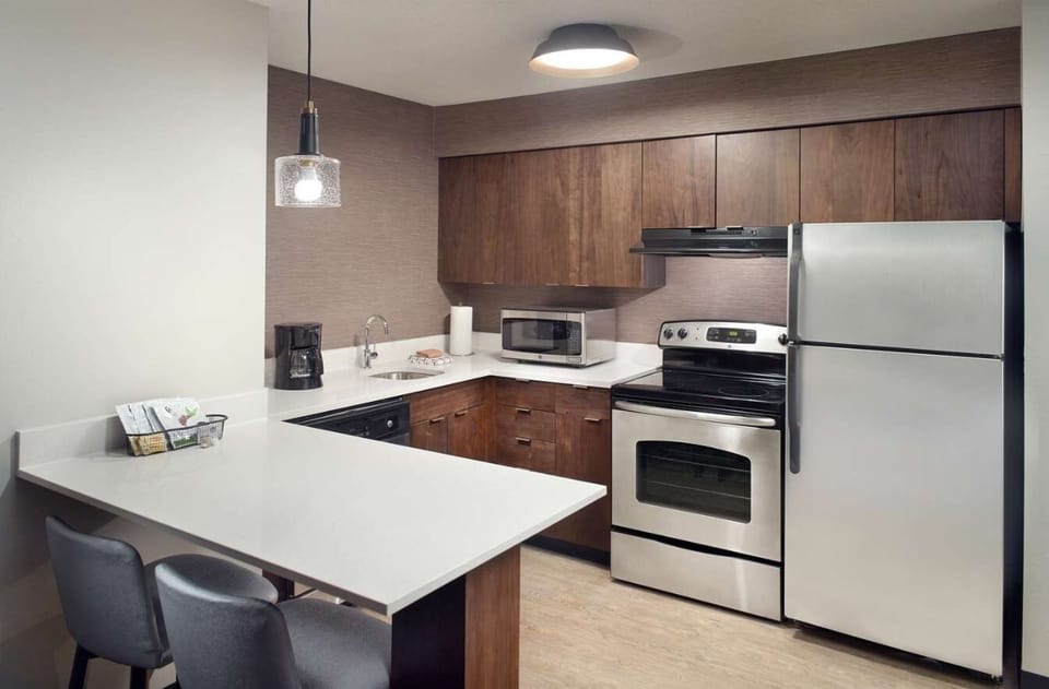 Cook with ease in the sleek kitchen and full appliances.