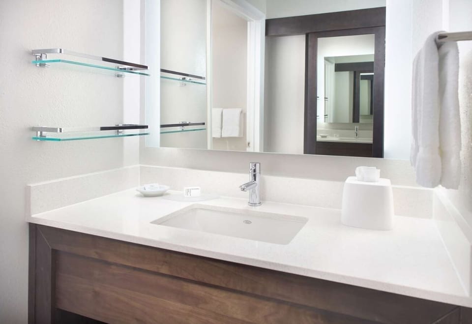 Freshen up at the bright vanity with plenty of counter space.