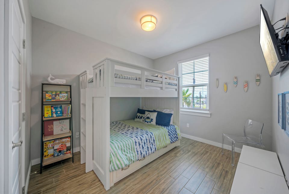 Bedroom 3 features a twin over twin bunk bed. (The Blue Crab)