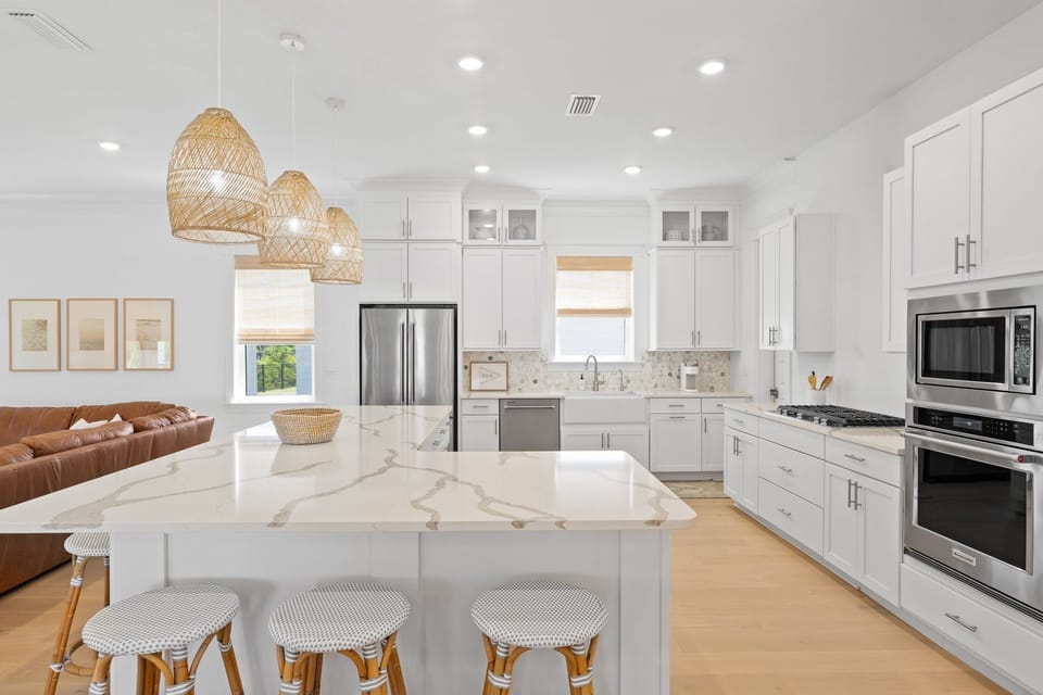 Spacious gourmet kitchen with island seating.