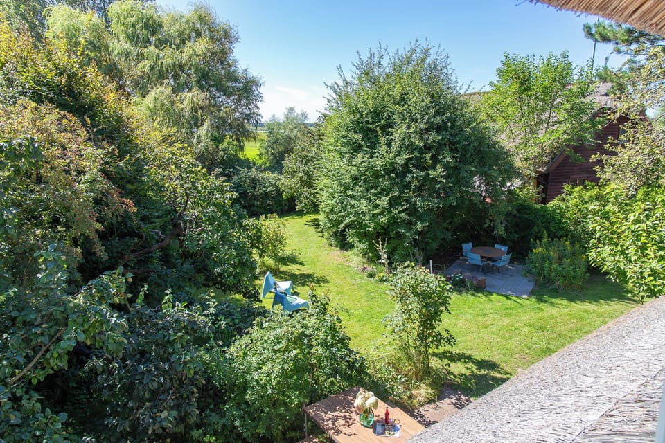 Garden with Seating Areas and Lush Greenery