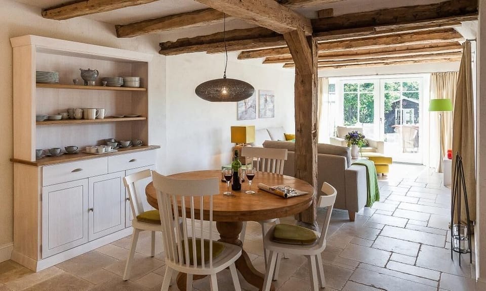 Kitchen with Dining Table and Large Windows