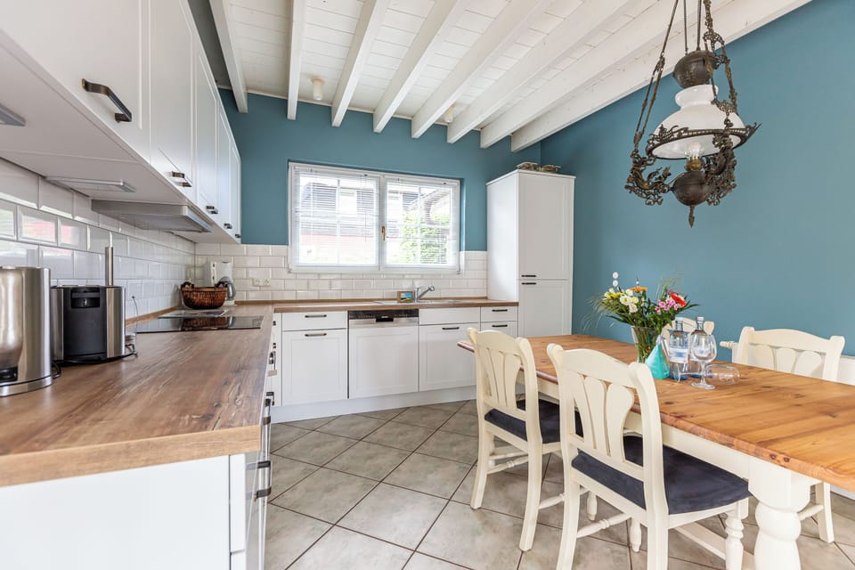 Modern Kitchen with Dining Area and Wooden Details