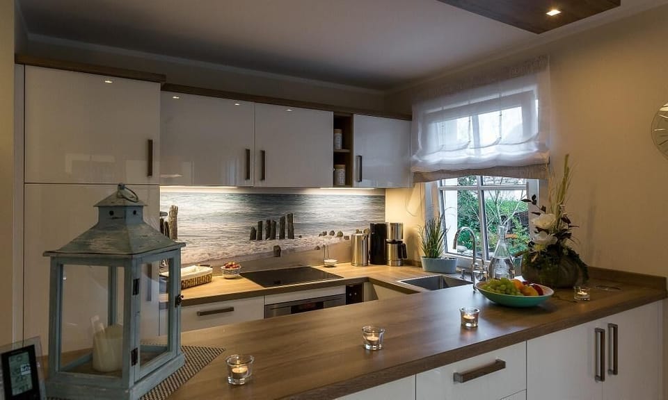 Modern Kitchen with Wooden Accents and Garden View