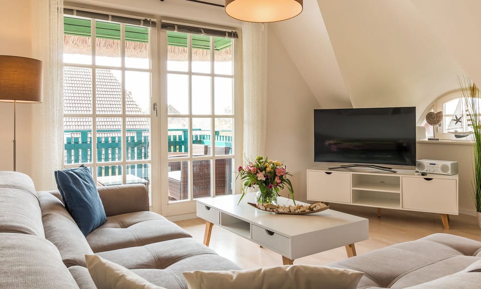 Bright Living Room with Sofa and TV