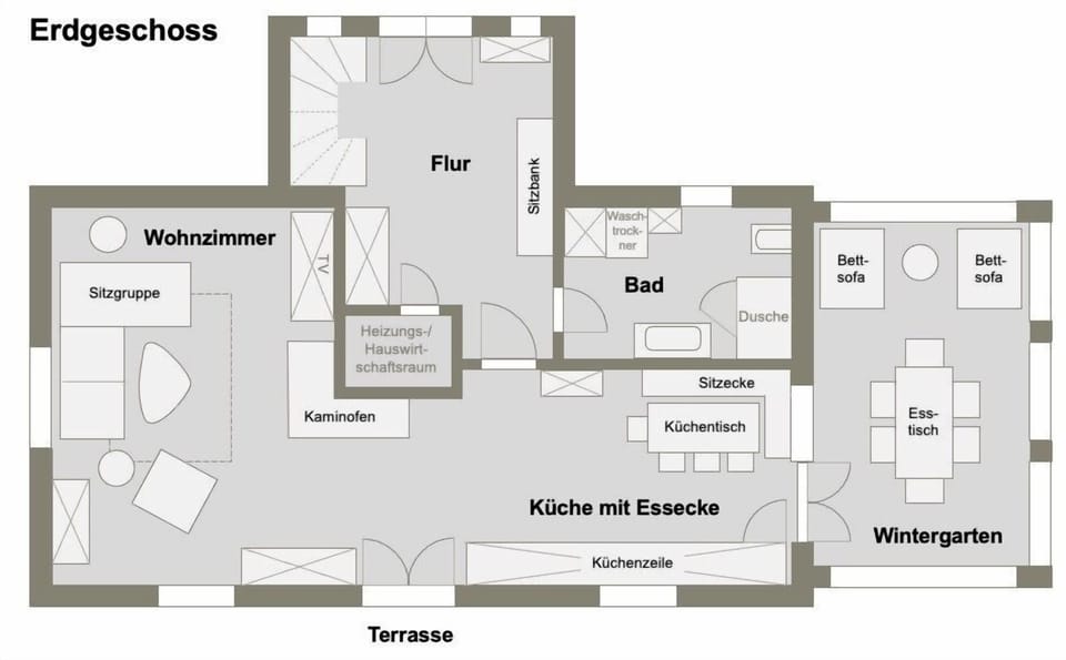 Ground Floor Layout with Living Area, Kitchen, and Terrace