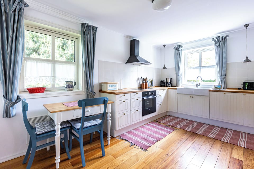 Modern Kitchen with Table and Windows