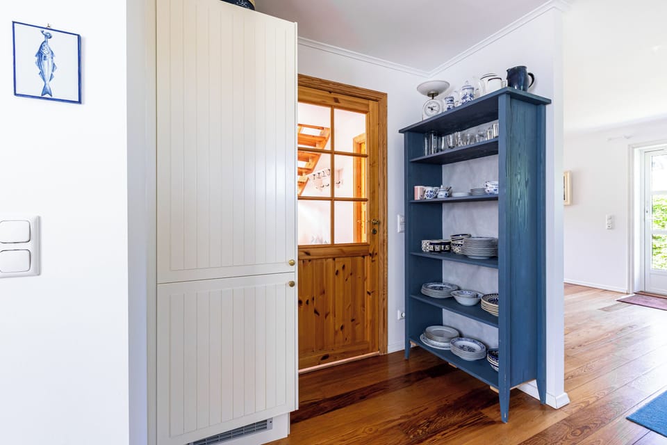 Kitchen with stylish shelf for dishes