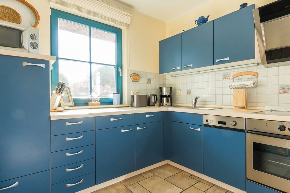 Bright Kitchen with Blue Cabinets