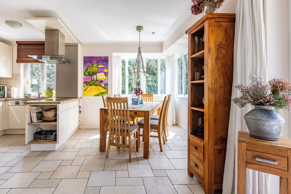 Modern Kitchen with Wooden Dining Table