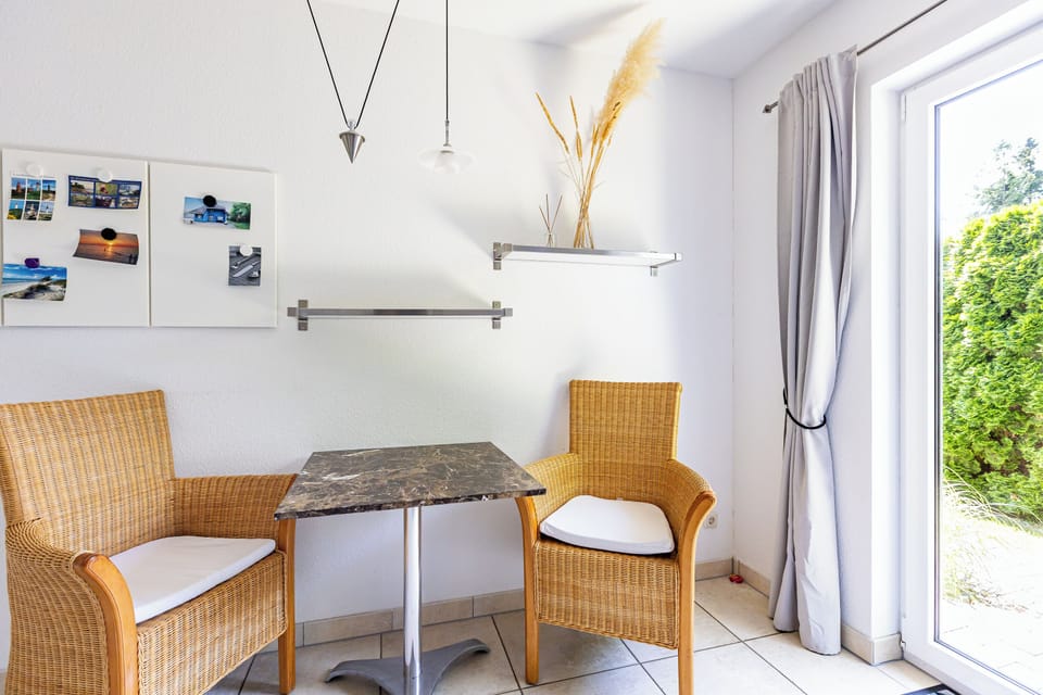 Kitchen area with chairs and table